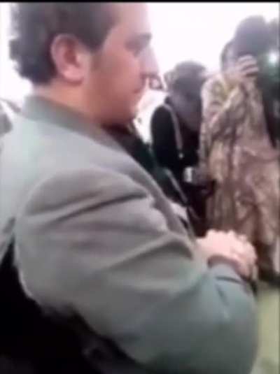 Taliban sets a musician's instruments on fire and the musician can't hold his tears.