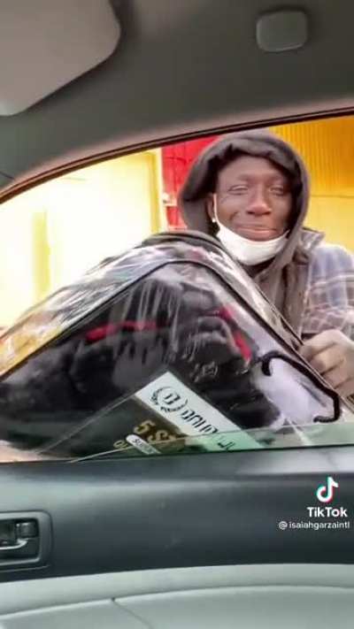 Man asks a homeless guy:"what can put a smile on your face?"