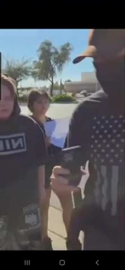 Grown and armed MAGA man refusing to follow Police orders to leave high school ICE-walkout protest