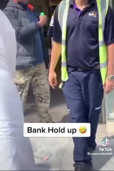 Guy holds up a bank for &pound;1m with a water pistol.