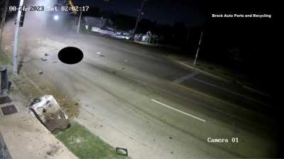person is thrown from a crashing car (2 angles of crash)