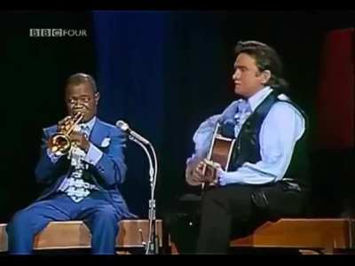 Johnny Cash &amp;amp; Louis Armstrong performing "Standing on the Corner (Blue Yodel No. 9)". Sunday Night With Johnny, 1970.