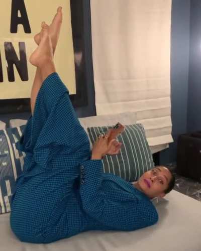 On her back