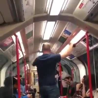 Young woman being threatened by drunk man on central line in London &amp;amp; bunch of guys come to the rescue