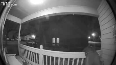 To force his way in through the door.