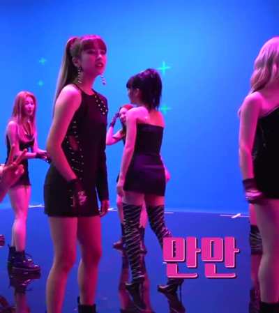 Mina bending over