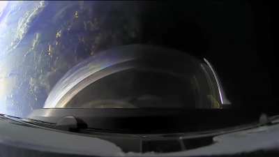 "View of an orbital sunset from Dragon's cupola" by SpaceX