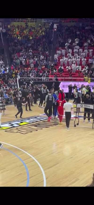 Luka saw the 76ers mascot hit an amazing backwards half-court shot and tried to do the same thing