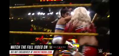 Bayley carries Alexa Bliss in NXT