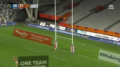 Sam Gilbert kicks a 40m drop goal after a quick throw in