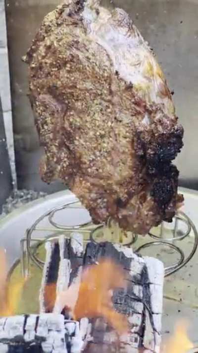 Tried a slow smoke then sear with a 2.5 lbs ribeye on my outdoor vertical rotisserie. It&rsquo;s Non traditional but dang it Turned out a amazing. That sizzle sound makes me drool