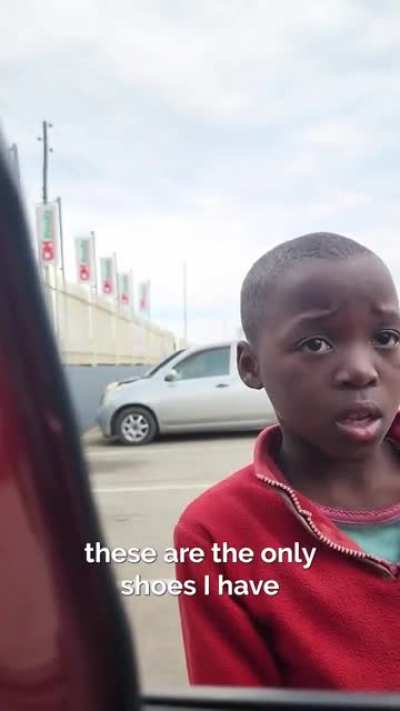 Man gives money to child for...