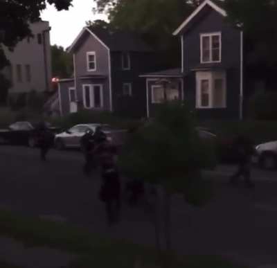 POV - you're deaf and on your own front porch, enjoying the "parade"
