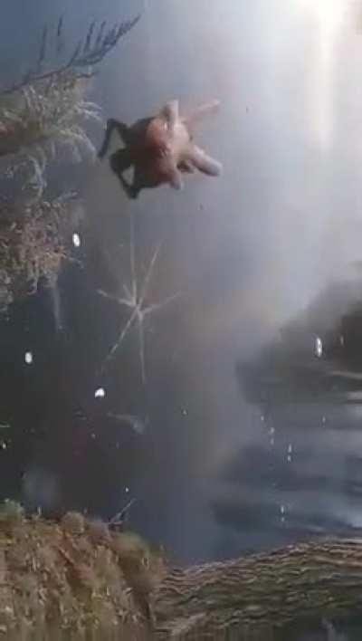 Back flip into a frozen lake.