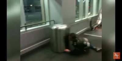 Sliding down an escalator