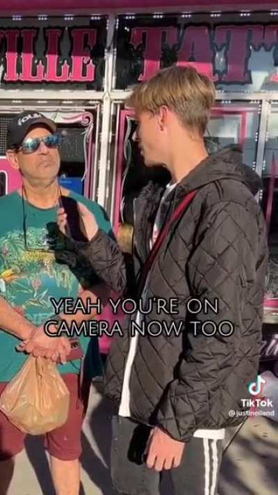 Drunk guy interrupts street interview.
