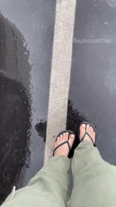 Playing in the rain my soles are soaked 💦💦
