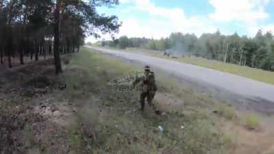 ua pov - Ukrainian SOF, who are inside Russian held territory in a wooded area, find and ambush a car driving on the road adjacent to them, once they confirm the kill, they quickly retreat. SPD company of the separate center "West" - "Fartovye". the outsk