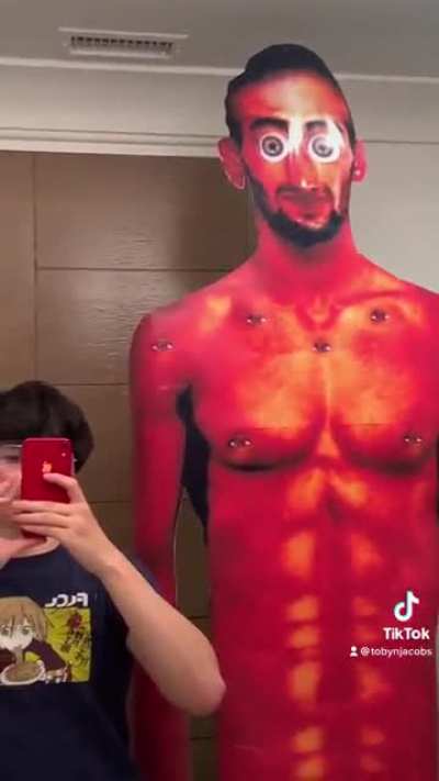 Man creates hideous monstrosity to defend his anime wife