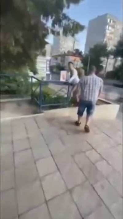 Anti-masker vs. Sausage wielding dude