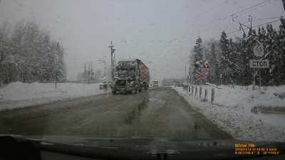 train hits truck, truck comes flying toward us - impressive reflexes (turn on sound for drama)