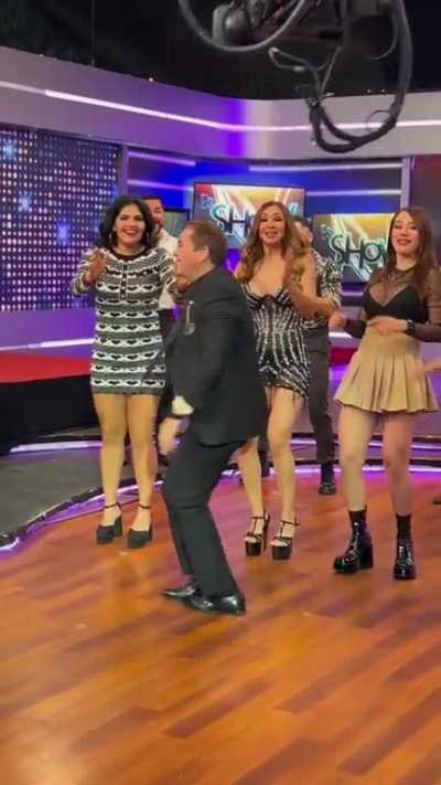 Cameraman tries to kill host
