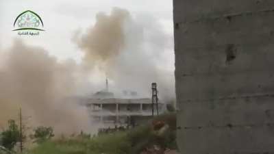 Front-end loader modified into a quad-barreled "Hell Cannon" sees action on the al-Khalidiya front, Aleppo - 5/5/2015