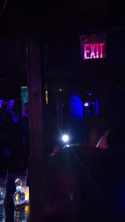 Comedian Mark Normand was escorted offstage tonight after a crazy chase interrupted his set.