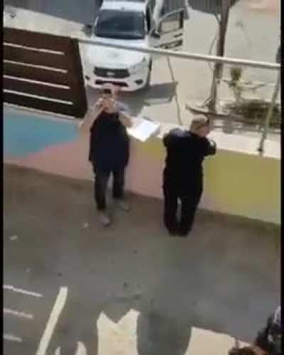 The occupation municipality of Jerusalem handing over a demolition order to Seyam family in Silwan village.