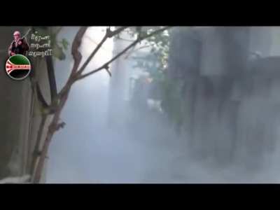 Mujahideen al-Sham RPG gunner lays in wait for the close range ambush on a Syrian Army tank - al-Buwaydah - November 2012