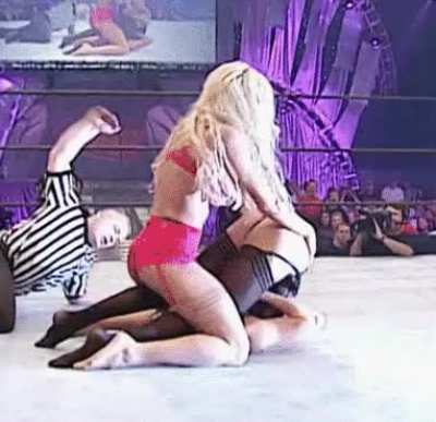 Torrie Wilson Spanking Stacy Keibler&rsquo;s lingerie clad Booty!