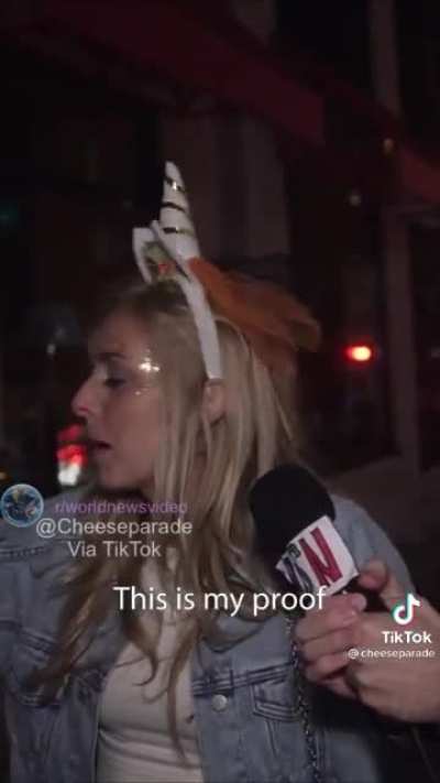 Fake Halloween reporter goes around interviewing people in costume