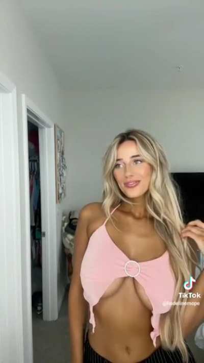 Her tanned body