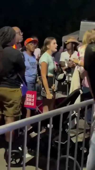 Woman yells in babies face at Kamala Harris rally