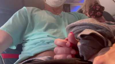 Risky public handjob on commercial flight