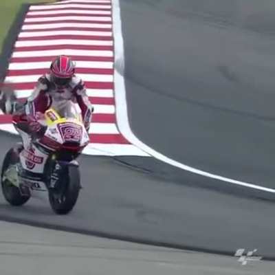 A man falls off falls off his bike