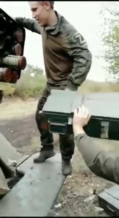 Russian military are recharging the BM-21 "Grad" MLRS