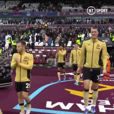 Mildly interesting: The shortest (5'4" Ryan Fraser) and tallest (6'7" Dan Burn) players in the Premier League walk out together for Newcastle at London Stadium.
