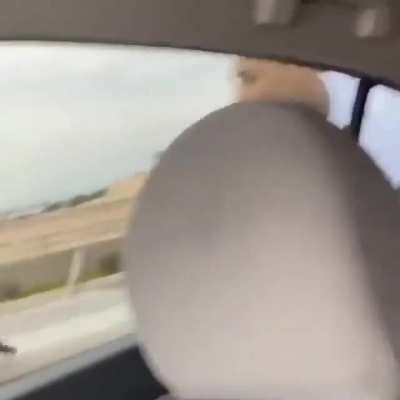 Woman films foot pursuit.