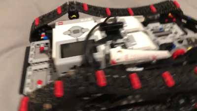 I made a really cool tank with &lsquo;suspension&rsquo; and geared motors.
