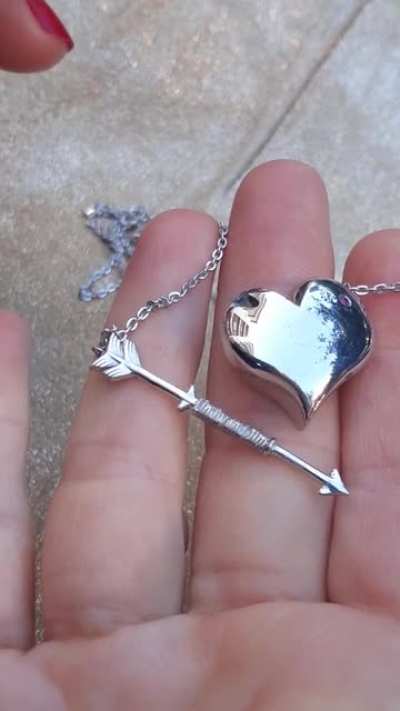 I lost count of the times I had to remelt and redesign this little silver necklace to get the lock mechanism inside functioning flawlessly. Finally it does. It is written "Linda and Tim" on the arrow which can be personalized by any name/letters.