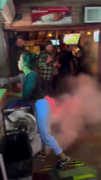 POS biker does a burnout inside a bar.
