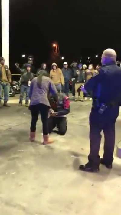 Using police holding you at gunpoint to propose to your girlfriend