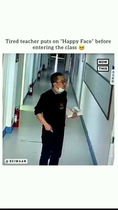 Exhausted teacher puts on a happy face before entering class
