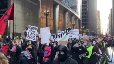 &ldquo;Fuck Trump, fuck Biden too, they don&rsquo;t give a fuck bout you&rdquo; chants as the march makes their way up Dearborn Street in Chicago