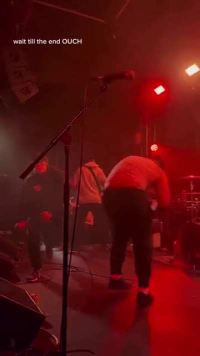 A quick sprint through the stage while a metal band pefrorms