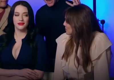 Elizabeth Olsen getting caught looking at Kat Dennings' cleavage