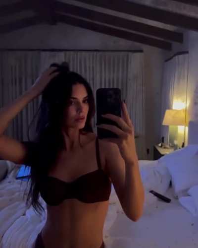 In front of mirror