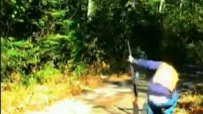 Guy spooks himself after almost accidentally shooting himself