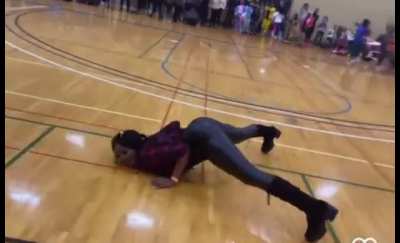 Three mothers engage in a twerking competition at a school